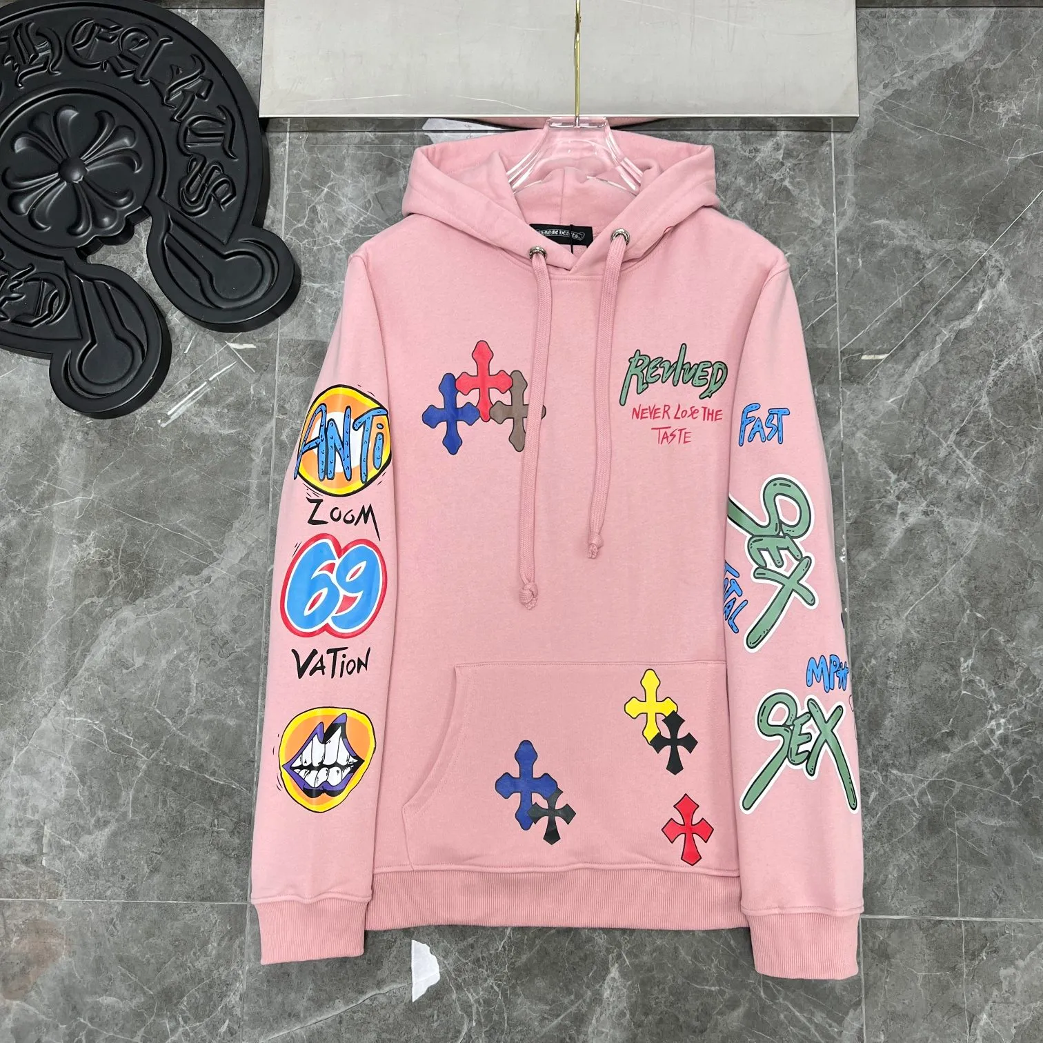 P250 Chrome Hearts Autumn and Winter 2025 counter synchronized Sanskrit hand-painted graffiti hooded sweatshirt, a must-have for Ins celebrity couples, same style for men and women! Specially customized version of 1:1 high-weight fabric, the same style as fashionable celebrities, a must-have for Internet celebrities! Recommended color: pink Size: S, M, L, XL